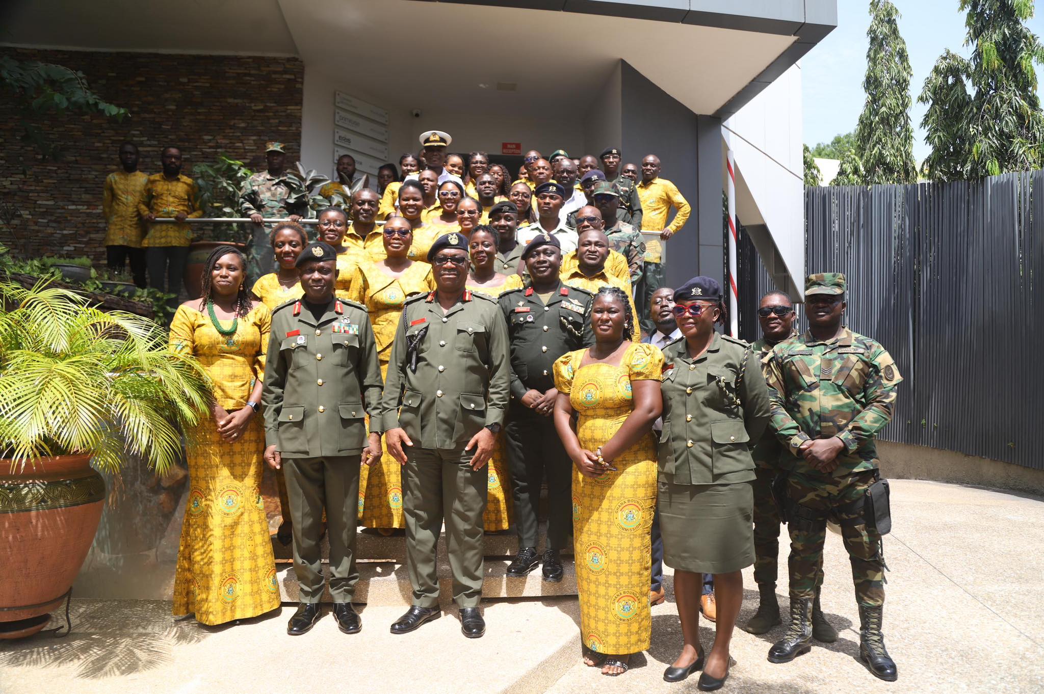 Home group picture with outgoing and incoming commissioner